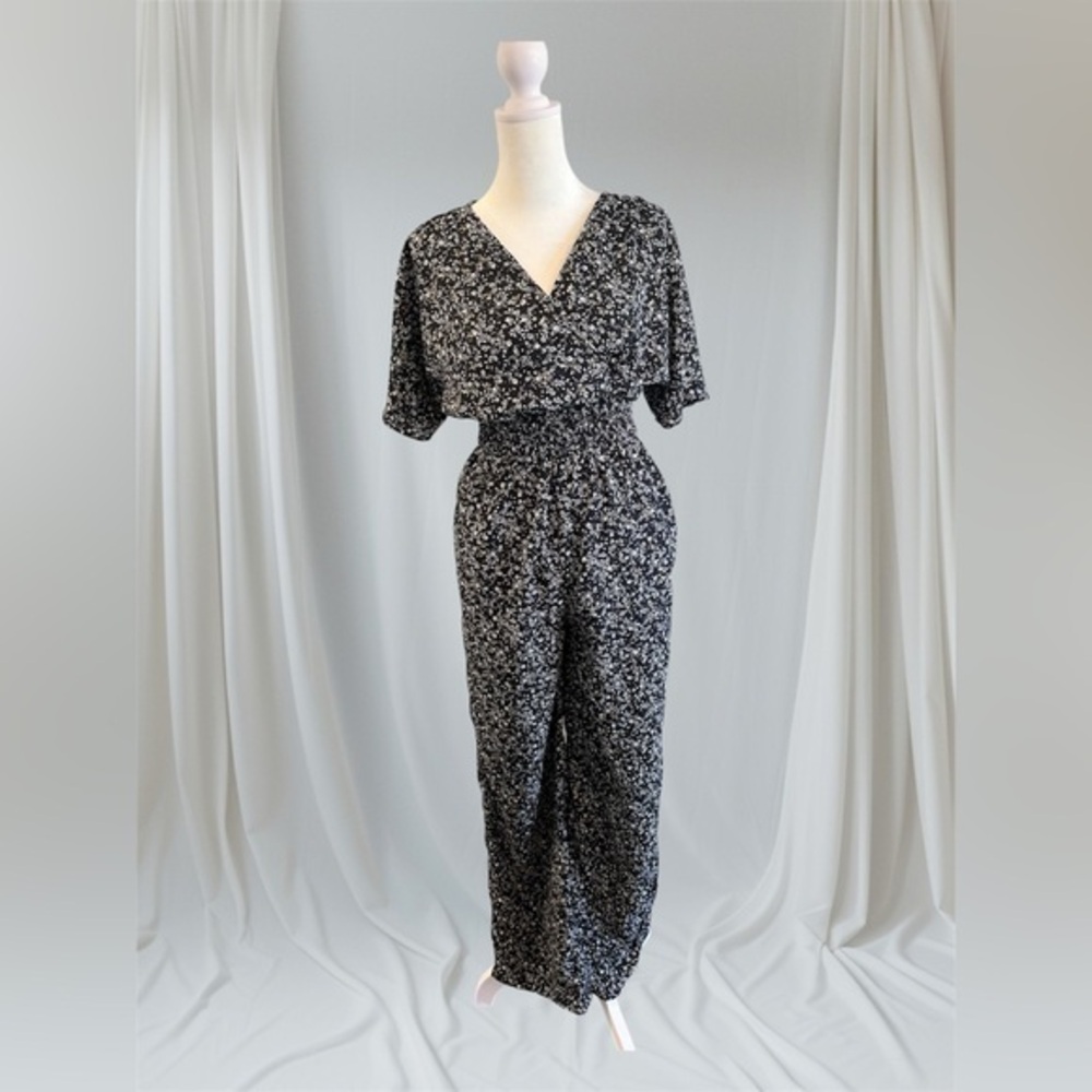 Small black cream floral Japna boutique jumpsuit romper smocked boho v neck